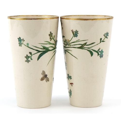 90 - A pair of Prattware beakers hand painted with foliage and butterflies, inscribed C & E Pratt, King's... 