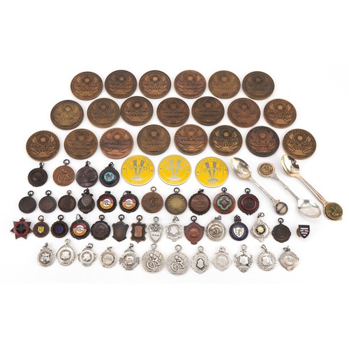 A large collection of motorcycling interest jewels and medallions, predominantly awarded to E Kennard, including bronze Sunbeam Motorcycle Club The Pioneer Run dating from 1951-1983, silver and white metal jewels, bronze jewels and teaspoons.
