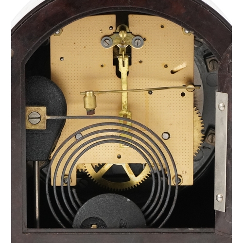 1722 - An Art Deco Smiths Enfield brown Bakelite striking mantle clock having Arabic numerals, 20cm high.