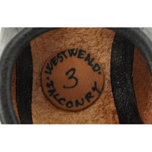 83 - Eleven vintage leather and fabric bird of prey falconry hoods, some with labels to the interior incl... 