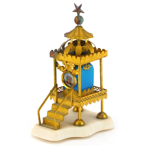 68A - A Grand Tour French opaline glass inkwell housed in an ornate brass marquis with a hand painted pane... 