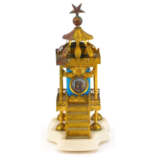 68A - A Grand Tour French opaline glass inkwell housed in an ornate brass marquis with a hand painted pane... 