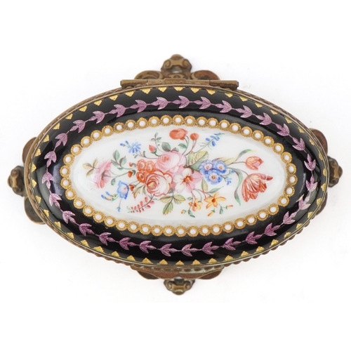 51 - A 19th century guilloche enamel jewellery casket with hand painted floral decoration and brass mount... 