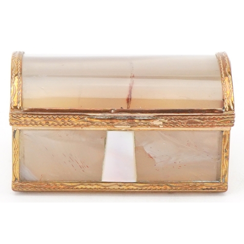53 - An early 20th century agate and mother of pearl trinket box with gilt metal mounts, 5.2cm wide.