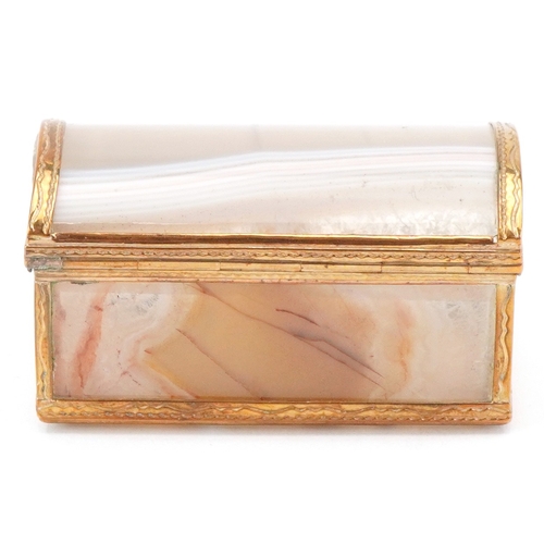 53 - An early 20th century agate and mother of pearl trinket box with gilt metal mounts, 5.2cm wide.
