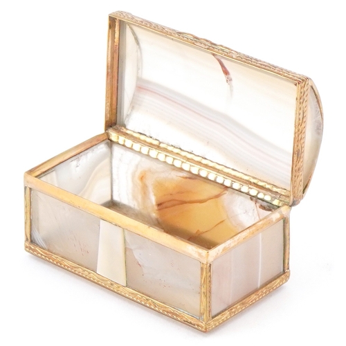 53 - An early 20th century agate and mother of pearl trinket box with gilt metal mounts, 5.2cm wide.