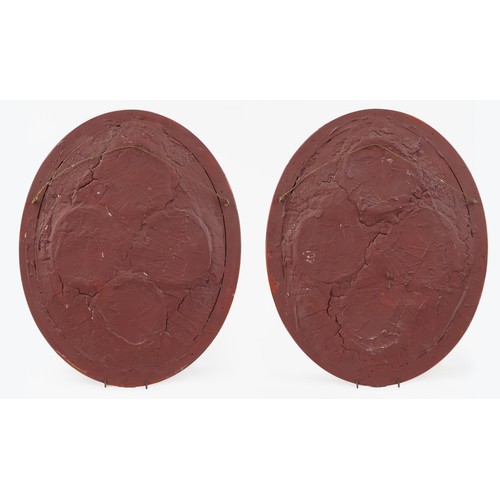 34 - Eight Grand Tour parian style cameos housed in two gilt burr wood oval frames, the frames 51cm x 41c... 