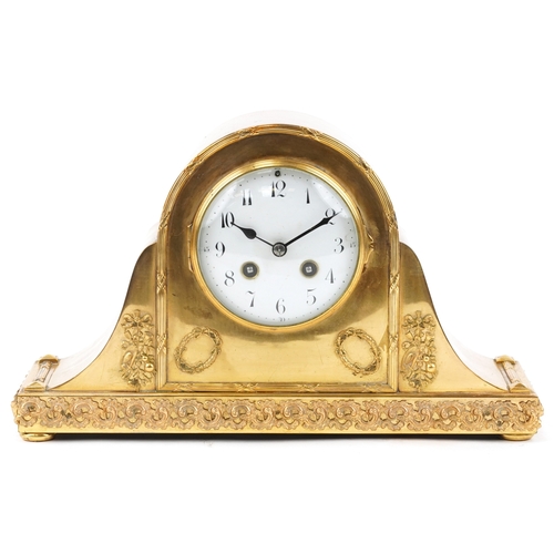 15 - A Rococo style gilt brass mantle clock having enamelled dial with Arabic numerals, striking on a gon... 