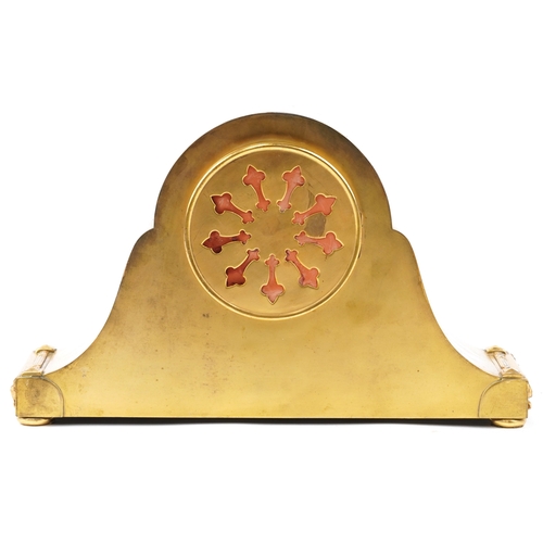 15 - A Rococo style gilt brass mantle clock having enamelled dial with Arabic numerals, striking on a gon... 
