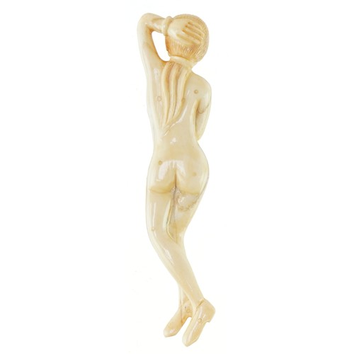 50 - A scrimshaw style carved study of a nude female, 12.5cm in length.