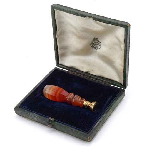 47 - A Victorian faceted agate and gold mounted desk seal with an unengraved bloodstone matrix, housed in... 