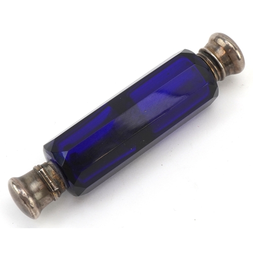 45 - A Victorian faceted blue glass double ended scent bottle with unmarked silver mounts, 10.5cm in leng... 