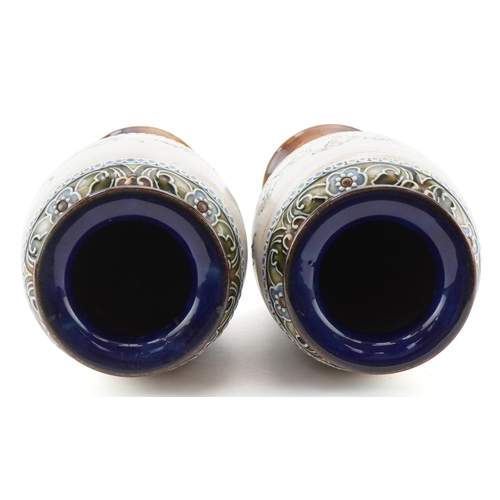 54 - Hannah Barlow for Royal Doulton, a matched pair of Art Nouveau stoneware vases, each incised with a ... 