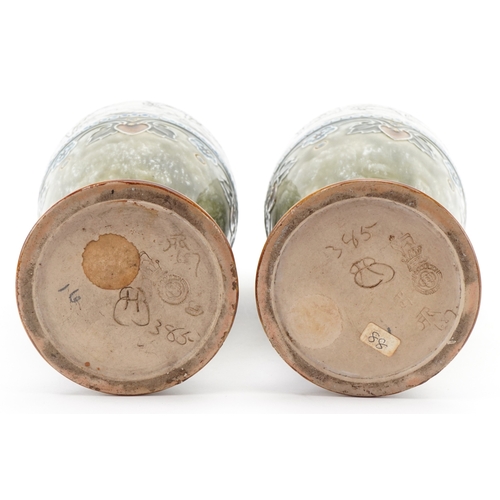 54 - Hannah Barlow for Royal Doulton, a matched pair of Art Nouveau stoneware vases, each incised with a ... 