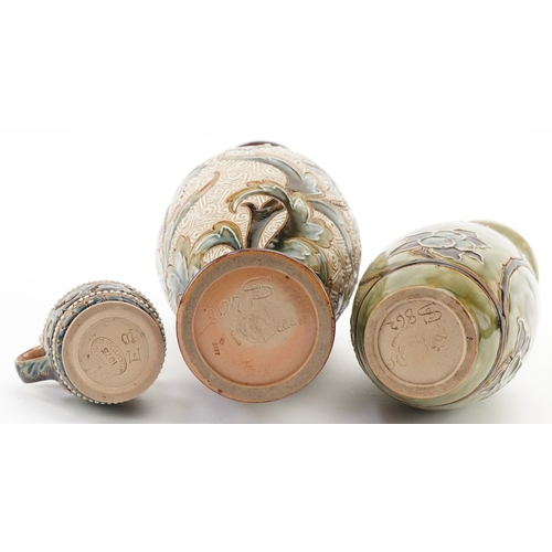 60 - Eliza Simmance for Doulton Lambeth, two Art Nouveau stoneware bottleneck vases and a mustard, the la... 