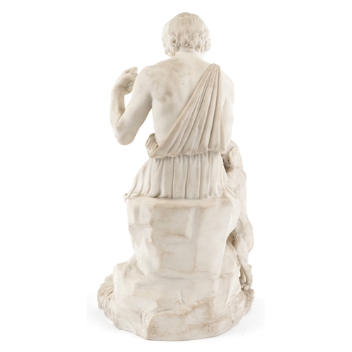 23 - A Victorian parian study of a seated hunter with a hound, 38cm high.