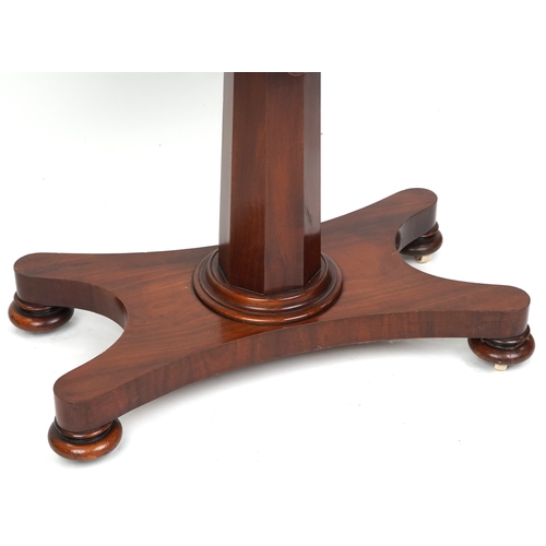 A Victorian mahogany adjustable reading table, the rectangular top ...