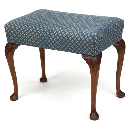 An early 20th century Queen Anne style mahogany stool, the overstuffed ...