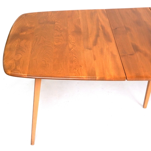 An Ercol elm and beech rectangular extending dining table, 72cm H x ...