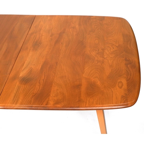 An Ercol elm and beech rectangular extending dining table, 72cm H x ...
