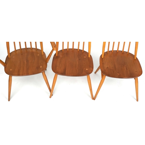 An Ercol elm and beech rectangular extending dining table, 72cm H x ...