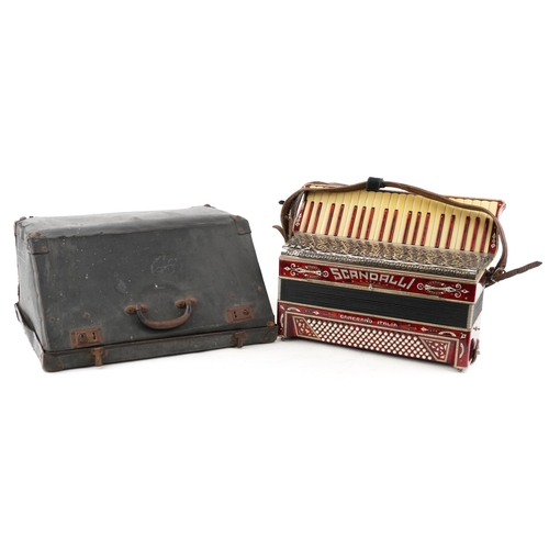 1436 - Scandalli, an Italian red marbleised piano accordion with protective case, 50cm wide.