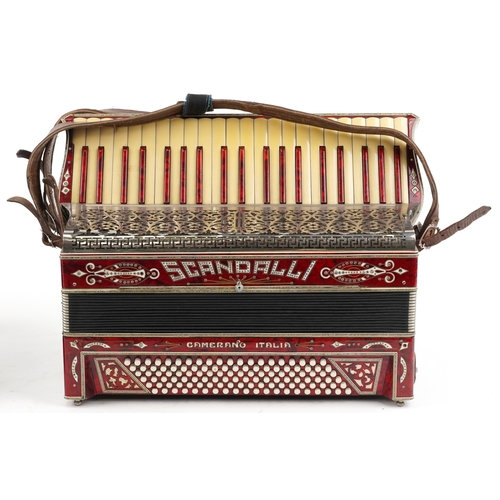 1436 - Scandalli, an Italian red marbleised piano accordion with protective case, 50cm wide.