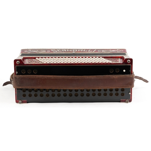 1436 - Scandalli, an Italian red marbleised piano accordion with protective case, 50cm wide.