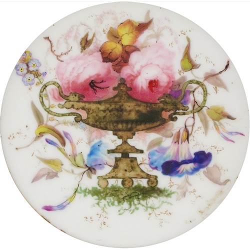 36 - Two 19th century porcelain plaques hand painted with flowers, each housed in a circular gilt frame, ... 