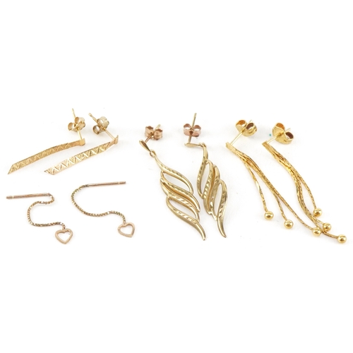 Four pairs of unmarked gold drop earrings, the largest 3.6cm high ...