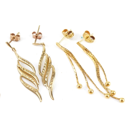 Four pairs of unmarked gold drop earrings, the largest 3.6cm high ...