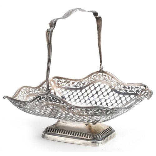 S Blanckensee & Son Ltd, George VI pierced silver basket with swing handle, retailed by Munsey & Co Cambridge, Birmingham 1938, 27cm wide, 622.0g.