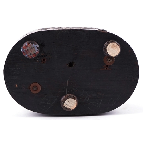 18 - A Victorian brass skeleton clock, the silvered dial having black enamelled Roman numerals, raised on... 