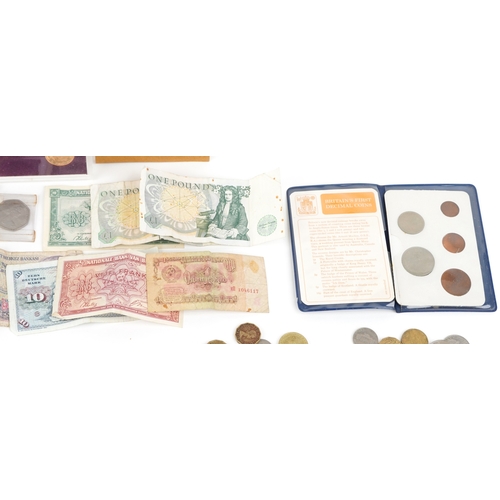 A small collection British and World coins and banknotes including, £5 ...