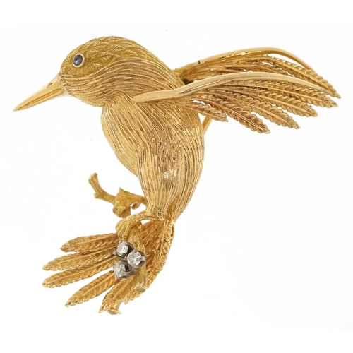 ***WITHDRAWN*** An 18ct gold diamond hummingbird brooch with sapphire set eye, 4.5cm high, 13.8g.