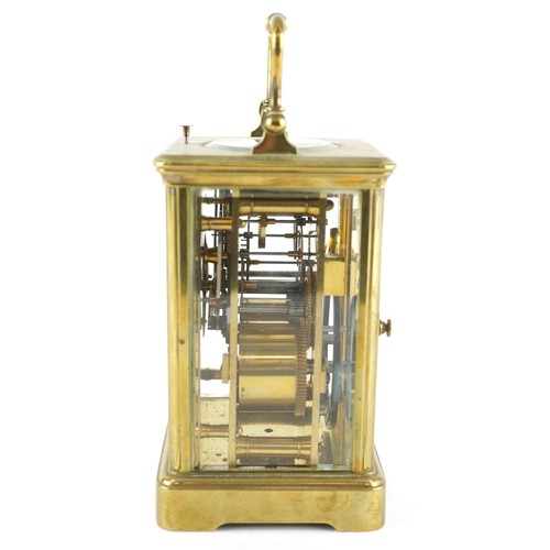 21 - An early 20th century gilt brass repeater carriage clock, the white enamelled dial with black Roman ... 