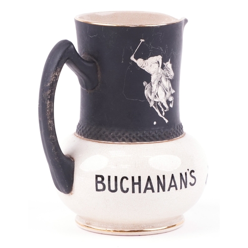43 - A Buchanan's polo player ceramic pub jug inscribed Black & White Whisky and Frank Beardmore & Co. Fe... 