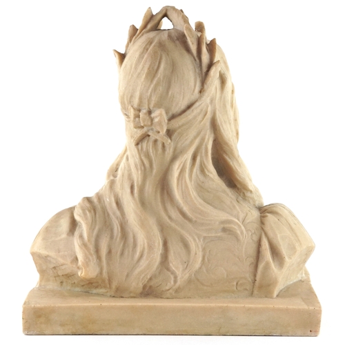 31 - An Art Nouveau style sandstone head and shoulders bust of a young female with laurel wreath, 28cm hi... 
