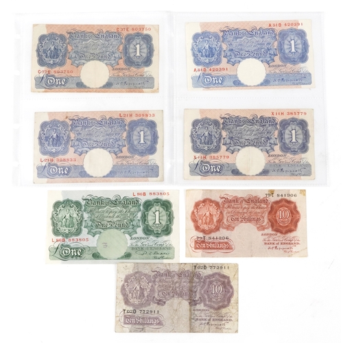 Four 1940s seated Britannia Bank of England blue one pound notes, Chief Cashier K. O. Peppiatt, serial numbers A51D 420391, X11H 385779, C37E 803750 and L21H 0308833 together with a green Bank of England seated Britannia one pound note, Chief Cashier P. S. Beale serial number L86B 883805, a mauve seated Britannia Bank of England ten shilling note, Chief Cashier K. O. Peppiatt serial number T02D 772911 and a brown seat Britannia brown ten shilling note, Chief Cashier K. O. Peppiatt serial number 79T 841906.