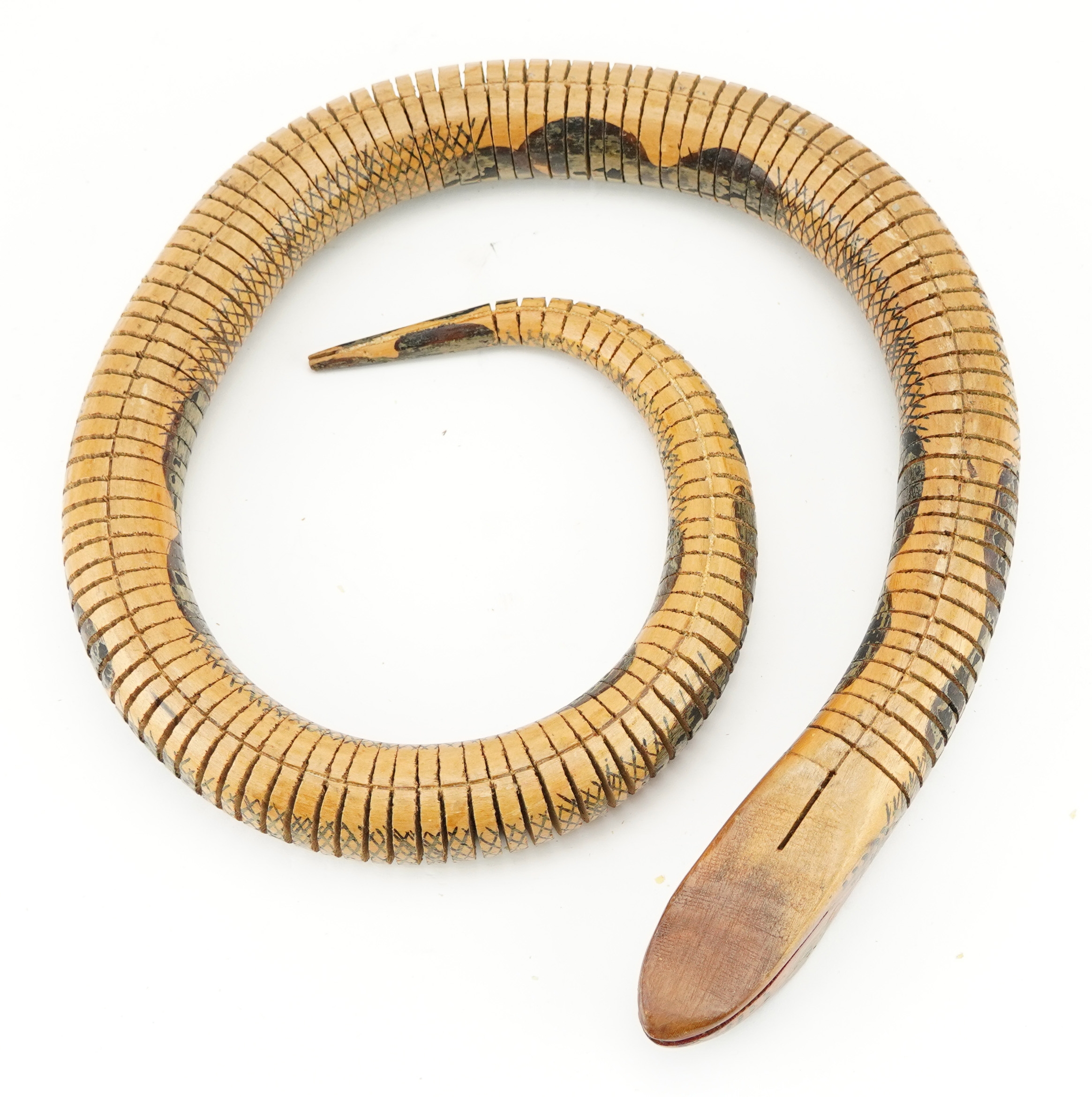 A vintage articulated wooden snake, 96cm in length.