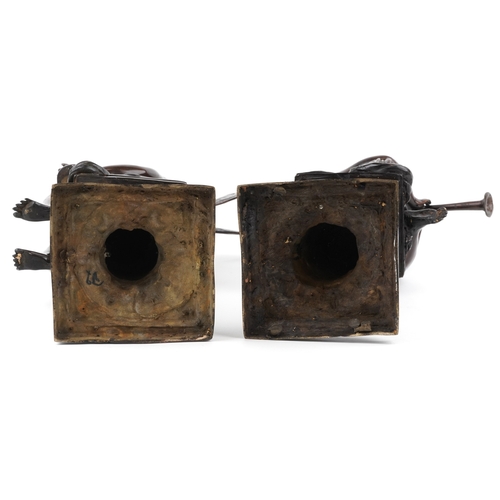 62 - After Alfred Joseph Charron - A pair of late 20th century bronze figures of fairies seated on pedest... 