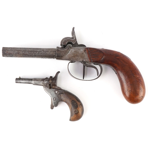 Two antique pistols including a double barrel percussion cap example with various proof marks, the largest 20cm in length.