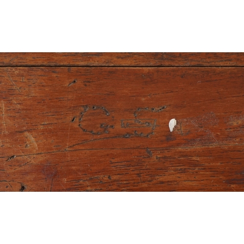 A set of brass typesetting plates, the box 24cm wide.