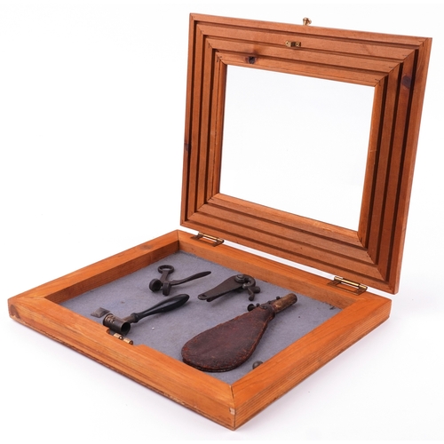 Military interest objects comprising leather powder flask, gun plate ...