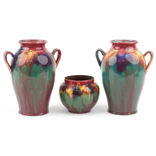 337 - Empire Ware, three multi colour porcelain vases, the largest 27cm high.