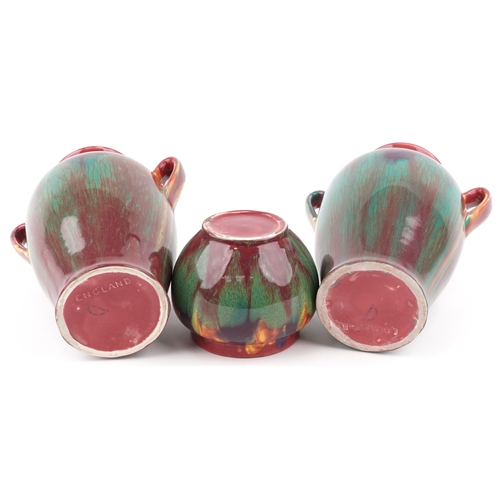 337 - Empire Ware, three multi colour porcelain vases, the largest 27cm high.