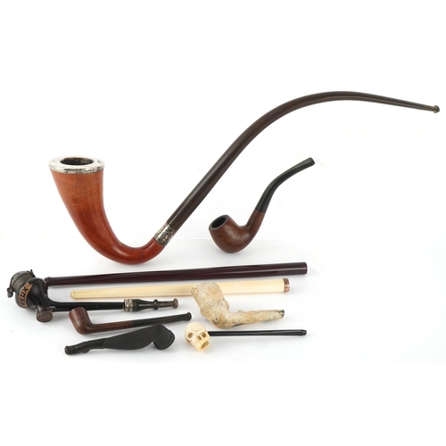 Antique and later smoking pipes including a bone cheroot holder with ...