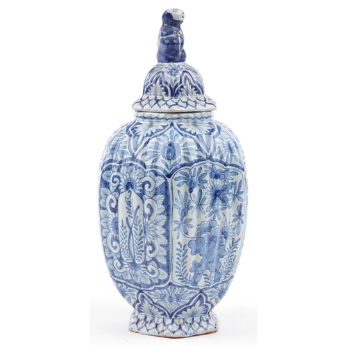 198 - A Chinese porcelain hexagonal vase and cover with animalia knop, hand painted with floral decoration... 
