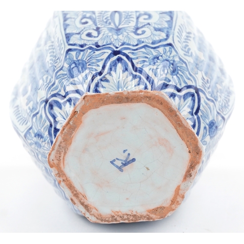 198 - A Chinese porcelain hexagonal vase and cover with animalia knop, hand painted with floral decoration... 