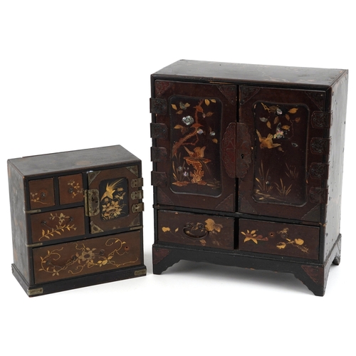1414 - Two Japanese black lacquered table top chests hand painted and gilded with birds amongst flowers, ea... 